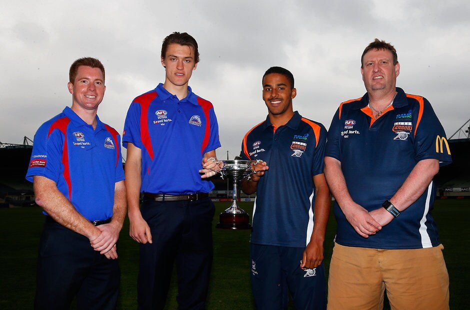 AFL 2014 Media - VFL and TAC Cup Grand Final Press Conference (L-R) Michael Stinear and Darcy Moore of the Oakleigh Chargers pose for a photo along side Touk Miller and Andrew Jago of the Calder Cannons during a press conference for the VFL and TAC Cup grand finals at Visy Park on September 16, 2014. (Photo: Sean Garnsworthy/AFL Media)